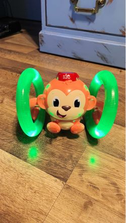 Bright Starts Roll & Glow Monkey Baby Toy with Lights and Melodies