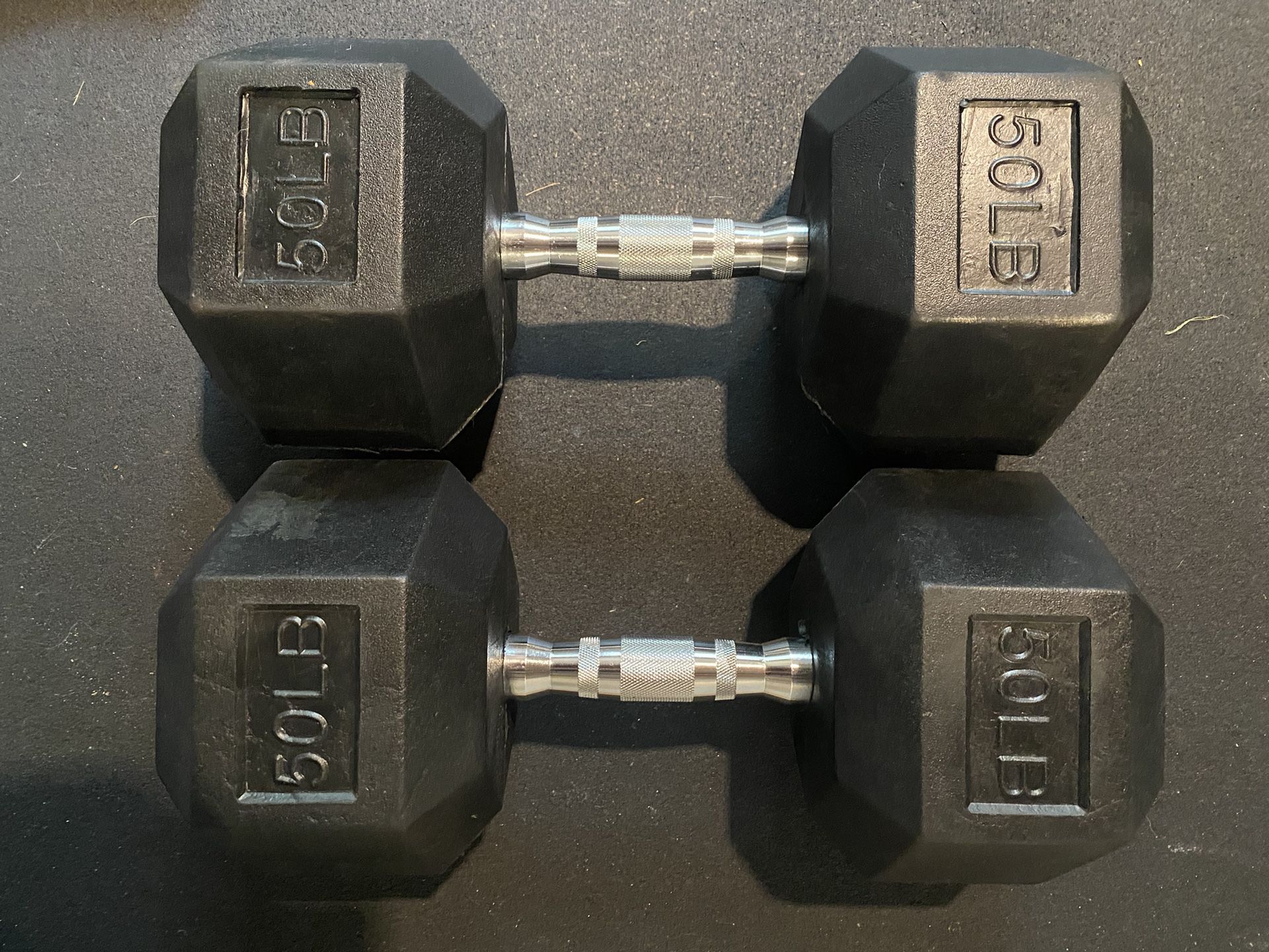 Pair Of 50 Lbs Rubber Dumbbells
