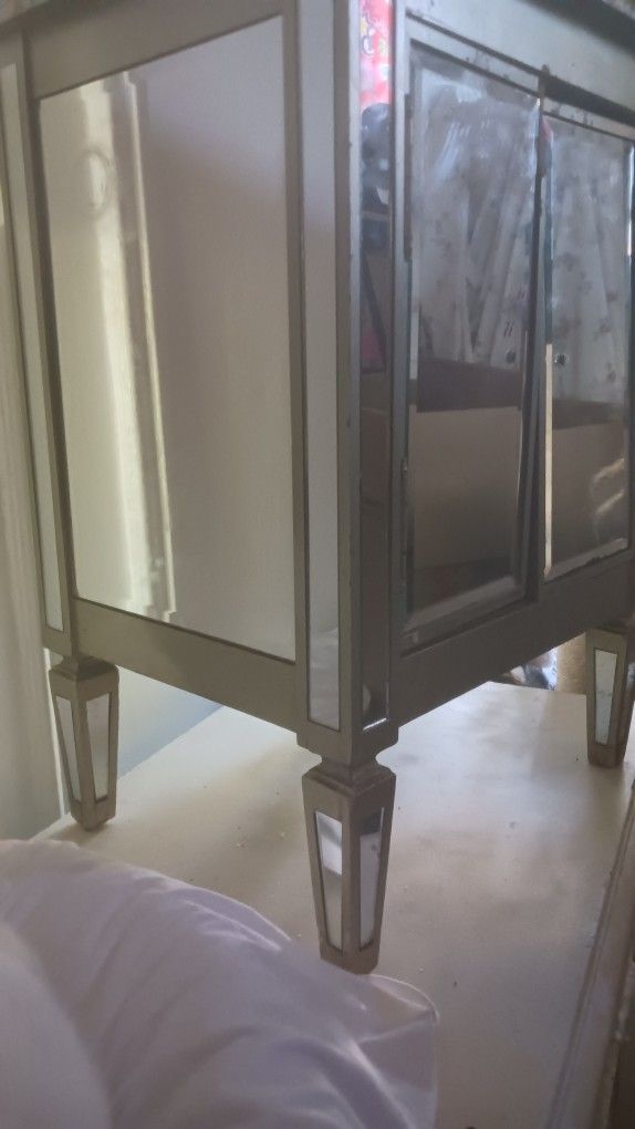 A Hollywood Regency Mirrored Side Table