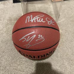Magic Johnson and shaq singed basketball