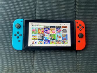 NINTENDO SWITCH + 125 POPULAR SWITCH GAMES