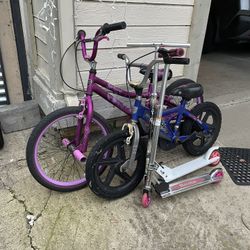 Two Kids Bicycles And Two Scooters