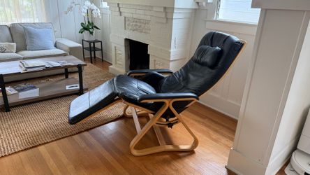 High-end solid wood and leather chair with adjustable seating; very comfortable. Price: $200. Location: Pasadena.