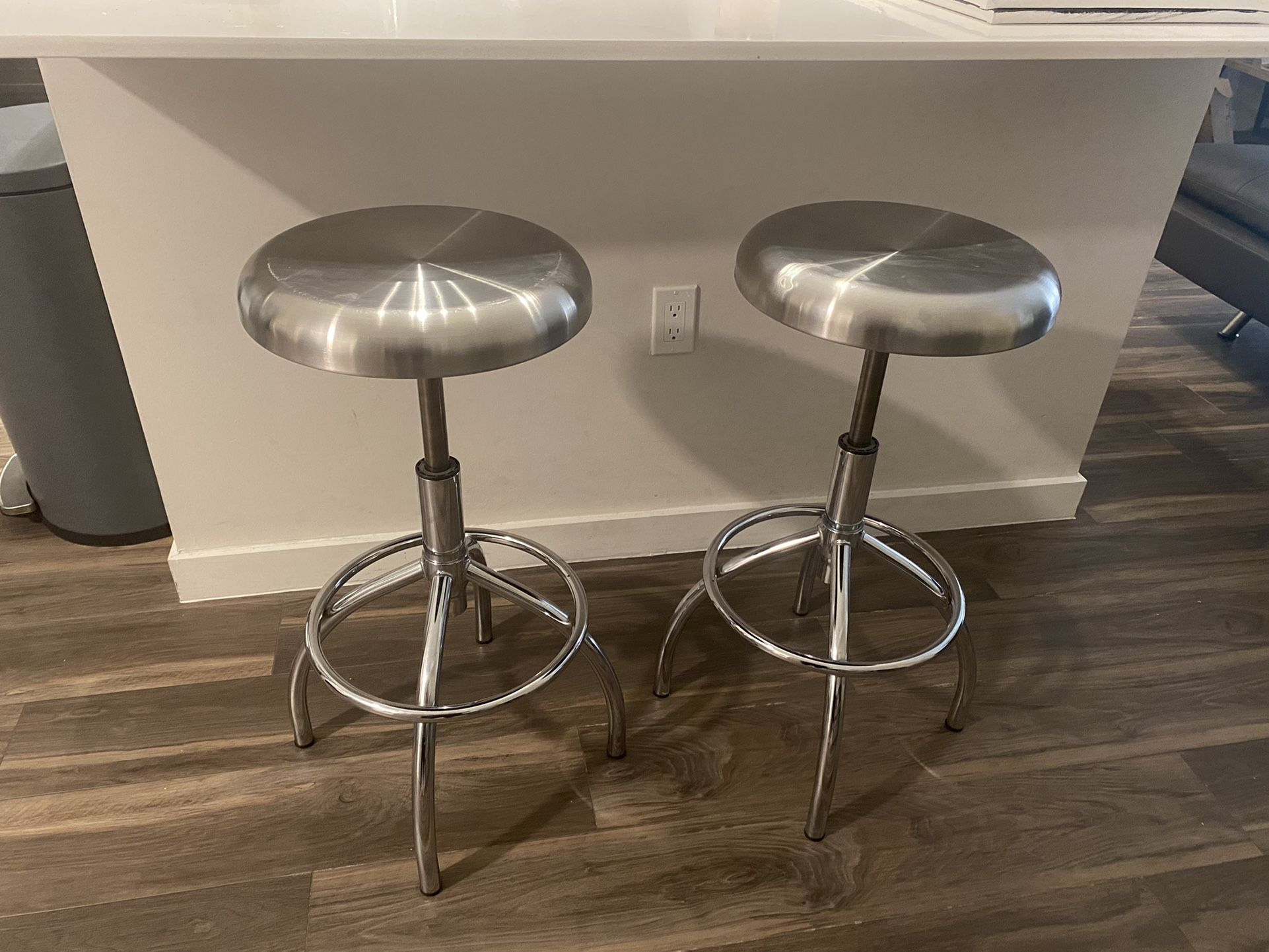 Two Silver Adjustable Bar Stools 