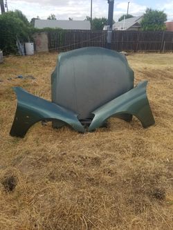 2003-2006 Infiniti G35 sedan hood and fenders