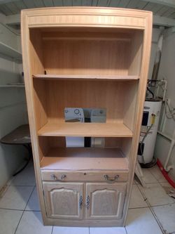Light wood hutch with shelves and cabinet