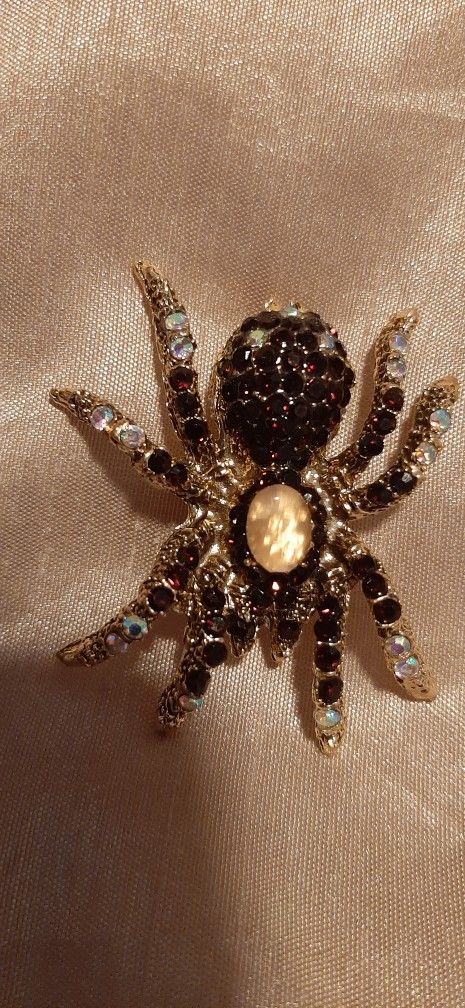 Decorative spider brooches with gemstones $10 each