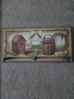 Wall entry hanging with pegs for coats etc