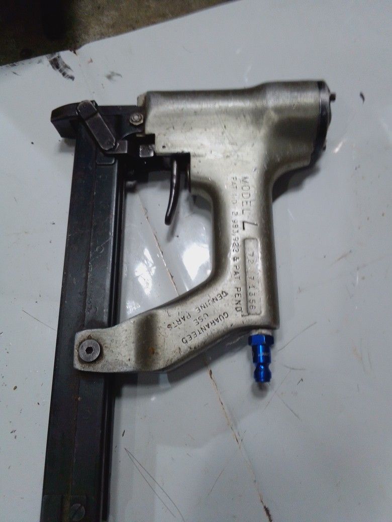 Senco Model L pneumatic staple gun