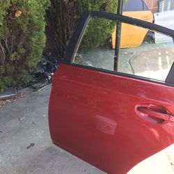 LEFT REAR DOOR 2015 TOYOTA PRIUS 1.8L RED COLOR