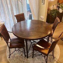 ROUND COPPER TOP DINING TABLE W/ TWIST IRON LEGS AND 4 CHAIRS WITH BEAUTIFUL DETAIL.  