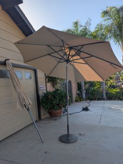 2 Outdora Sunvilla Patio Umbrella with light and Base