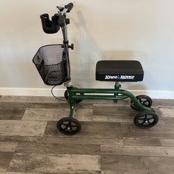 Knee Scooter / Saver Made By Knee Rover In Like New Condition With Basket , Water Bottle And Cell Phone Holder 