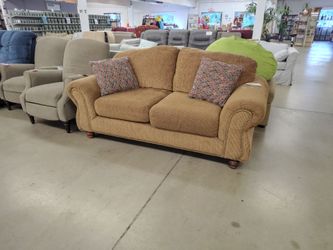 Dark tan love seat