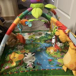 Fisher-Price Playmat Rainforest Music & Lights Deluxe Gym with 10+ Toys & Activites for Newborn Tummy Time Play