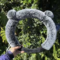 Fuzzy eared steering wheel cover