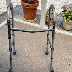 Invacare adjustable adult walker with wheels