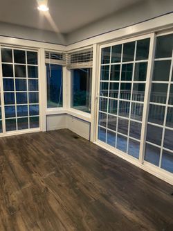 Used chesnut-colored laminate flooring for sale