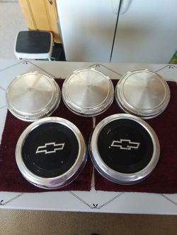 Old school hub covers, Chevy and Buick.