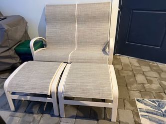 Outdoor rocking loveseat