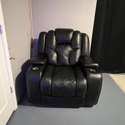 Leather Recliner bought new six months ago barely used moving my cell $800