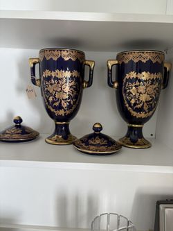 pair of large, lidded decorative covered vases