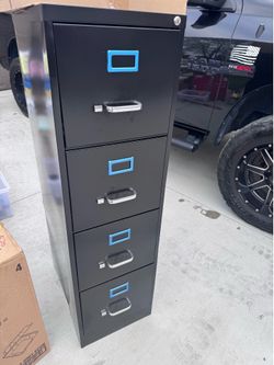 4 drawer 22” filing cabinet new with little dent with key