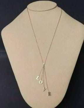 $450 RARE Tiffany & Co. Diamond LOVE Letter Necklace