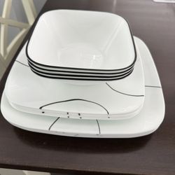 Corelle Dinnerware Set. 16 pieces. Used. 4 dinner plates, 4 salad plates, 4 bowls and 4 mugs.