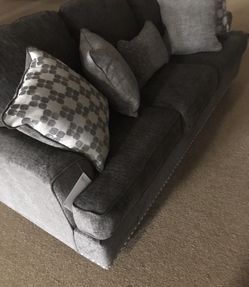 Stylish living room couch with pillows