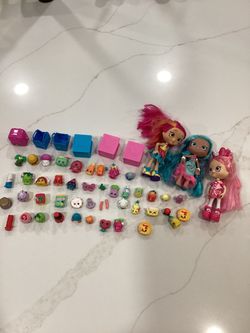 Various Shopkins dolls and pieces