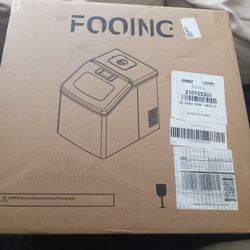 A BRAND NEW ICE MACHINE MAKER NEW IN THE BOX.