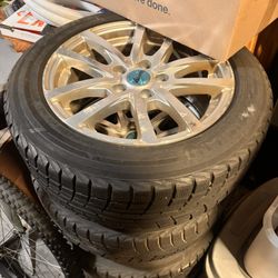 4 Yokohama/205/55R16 Tires Mounted On Wheels.