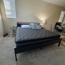 Black metal king bed frame
