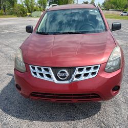 Red Nissan Rogue SL