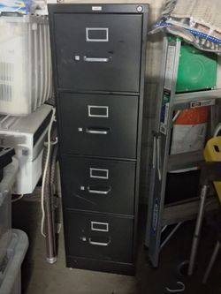 Heavy-Duty 4-Drawer Metal Filing Cabinet – Great Deal.       $35  O.B.O.
