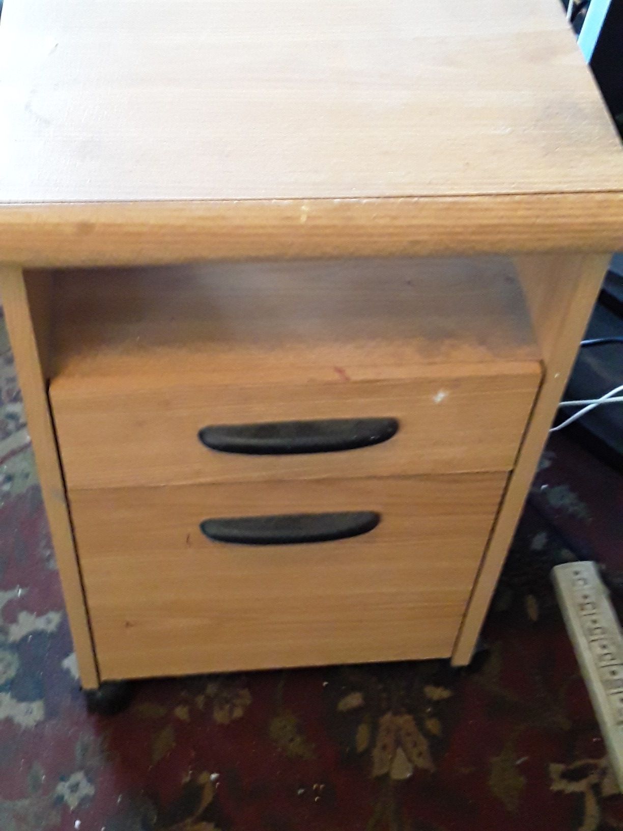 Small filing cabinet on wheels