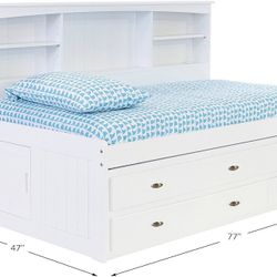 Ikea White Bed frame With Twin Pullout Bed Under. Has Two Drawers On Bottom For Extra Storage. Side Compartments For Secret Storage. Book Shelves 