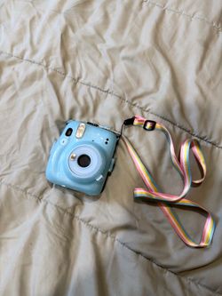 Blue Instax Mini 11 with lanyard & protective case