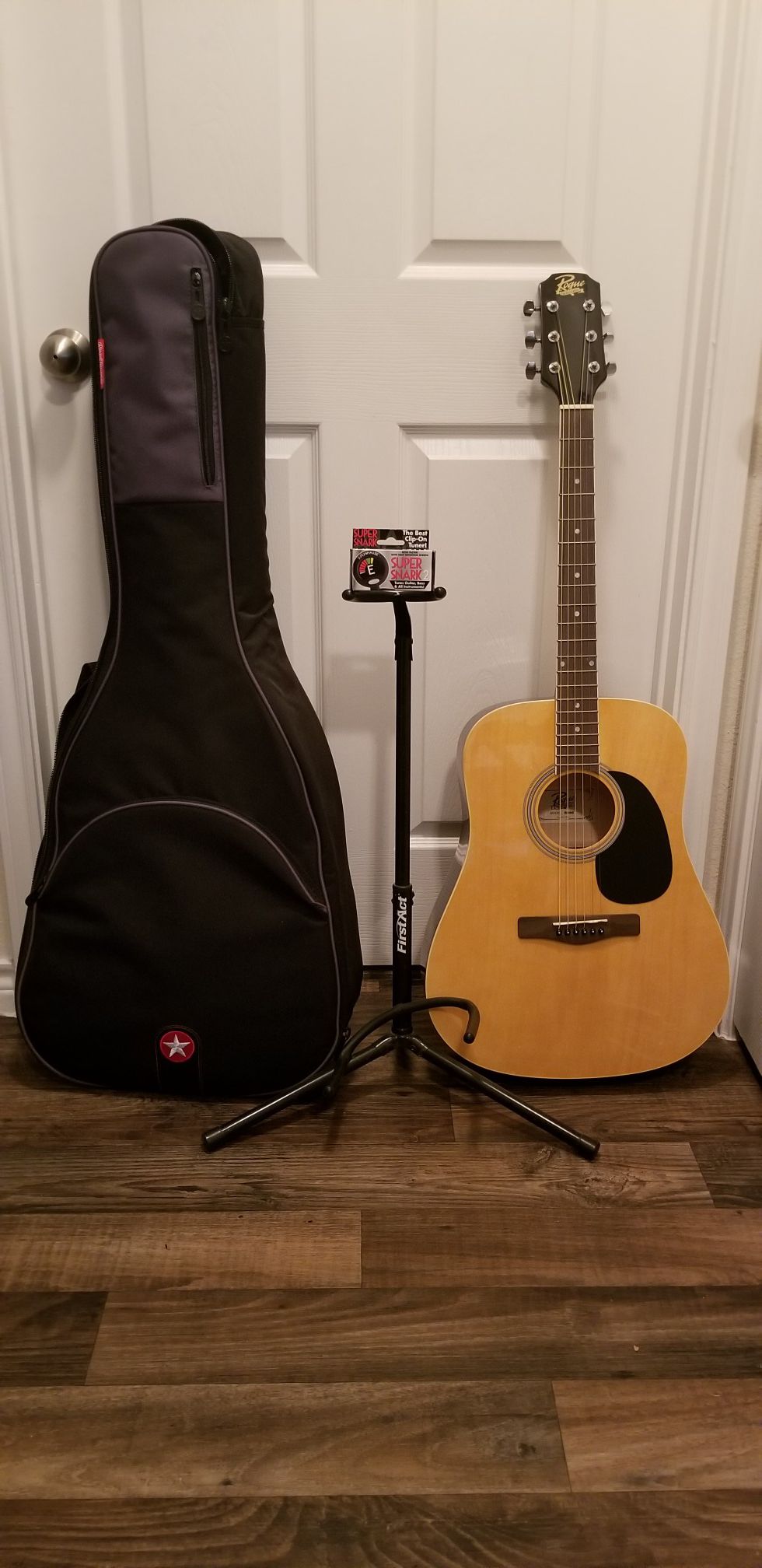 Acustic Guitar Rogue, Swing Wall Guitar Holder, Clip on Tuner, Gig Bag and Guitar Stand