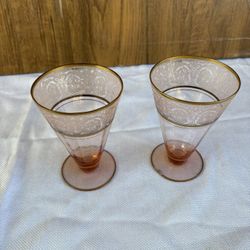 vintage glasses are identified as "Decoration 889 Rose (Gold Trim)" footed tumblers produced by Glastonbury - Lotus. 