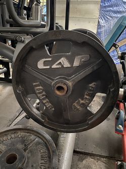 100 pound olympic plates CAP cast iron PAIR