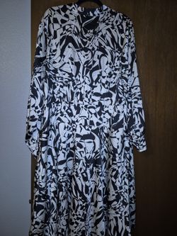 There are two different dresses SIZE  1X  BLACK AND WHITE AND  MUSTARD IN BLACK . Each dresses $30 each  but IFyou Wantthe RedSWEATERtogowithit?$ 25.