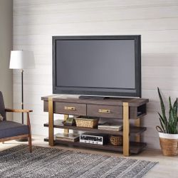 Dark brown wood and gold metal TV console with two drawers and two open shelves.