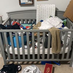 A brand new crib a year old my grandson slept in it maybe twice if that.