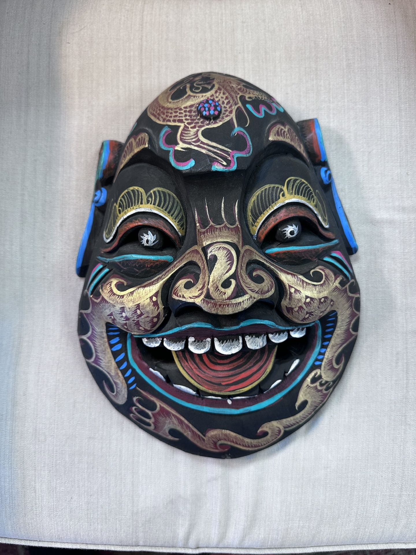 Hand-carved wooden mask
