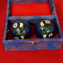Traditional Baoding art from Chinese culture in its original velvet box. and panda bear figurines.