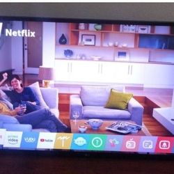 LG 49INCH SMART TV W/ ORIGINAL REMOTE 