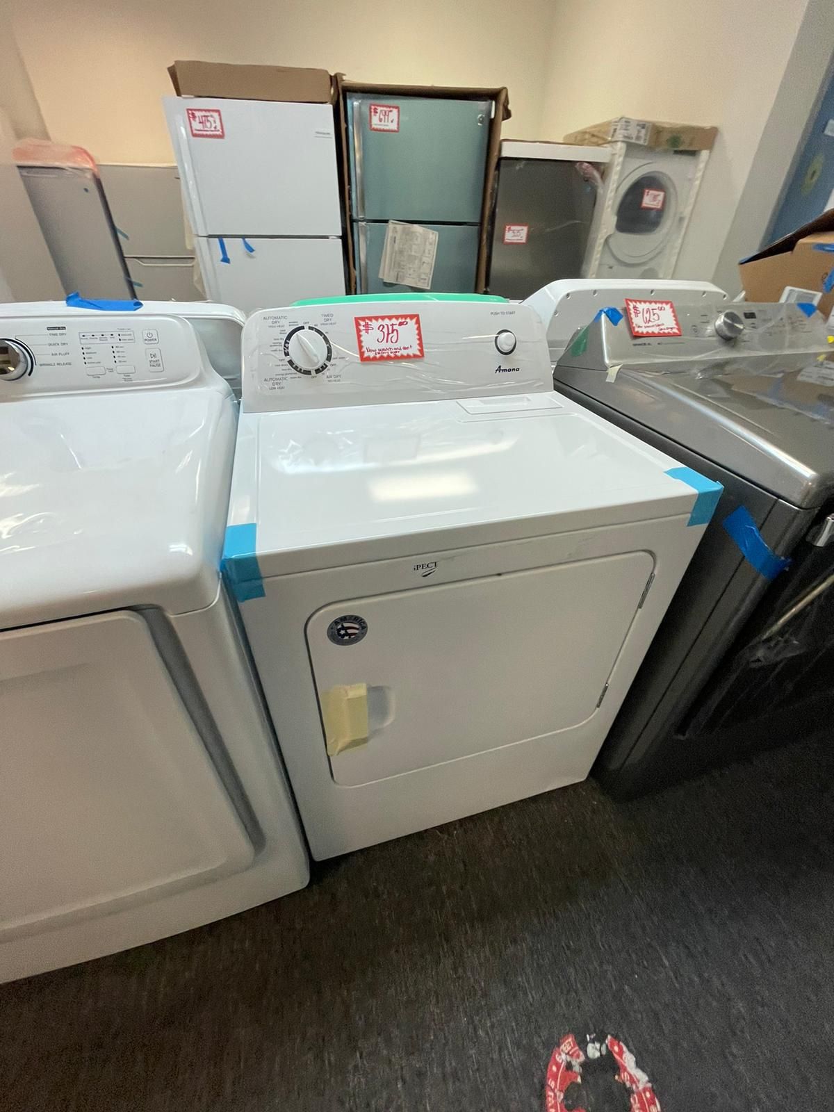 New Amana electric dryer scratched and dented with warranty
