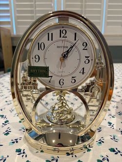 Rhythm Quartz Mantel Clock with Rotating Pendulum